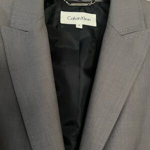 Gently worn. Two piece, women’s pant suit.